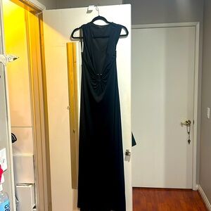 Sophisticated long black dress with a low V neckline